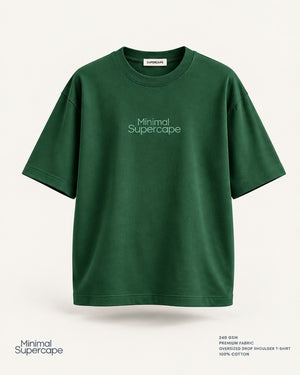 Minimal Bottle Green Oversized T-Shirt – premium front view with Minimal Supercape chest typography and SuperCape neck label; 240 GSM premium fabric, oversized drop shoulder T-shirt, 100% cotton