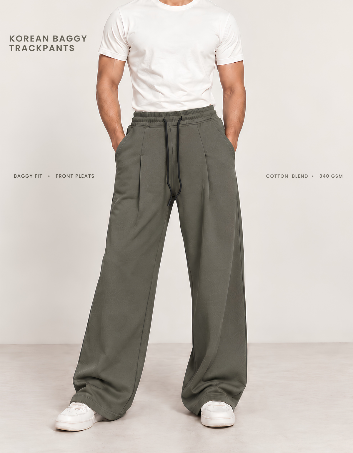Model wearing olive green Korean baggy pants, front view showing wide-leg silhouette and front pleats