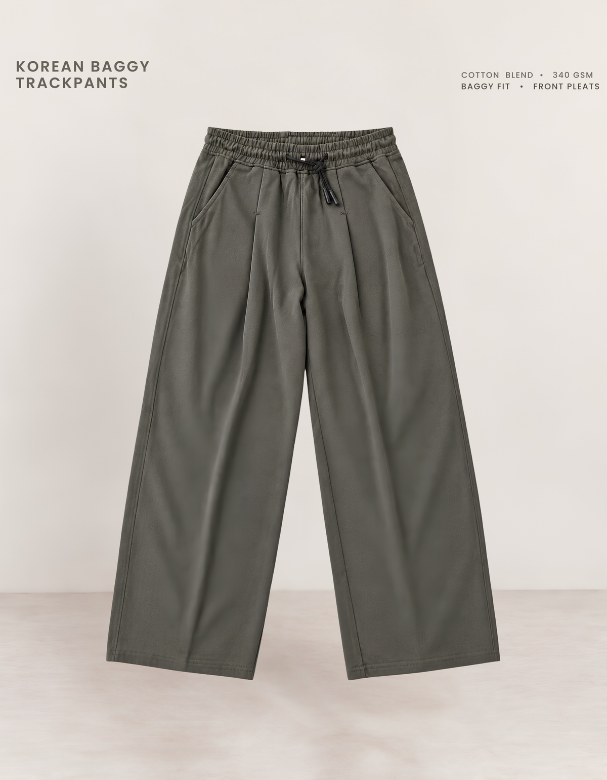 Olive green Korean baggy pants front view, 340 GSM cotton blend with elasticated waistband and drawcord