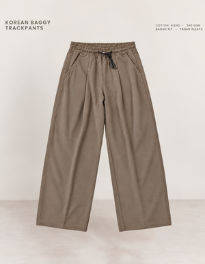 Brown Korean baggy pants front view, 340 GSM cotton blend with elasticated waistband and drawcord