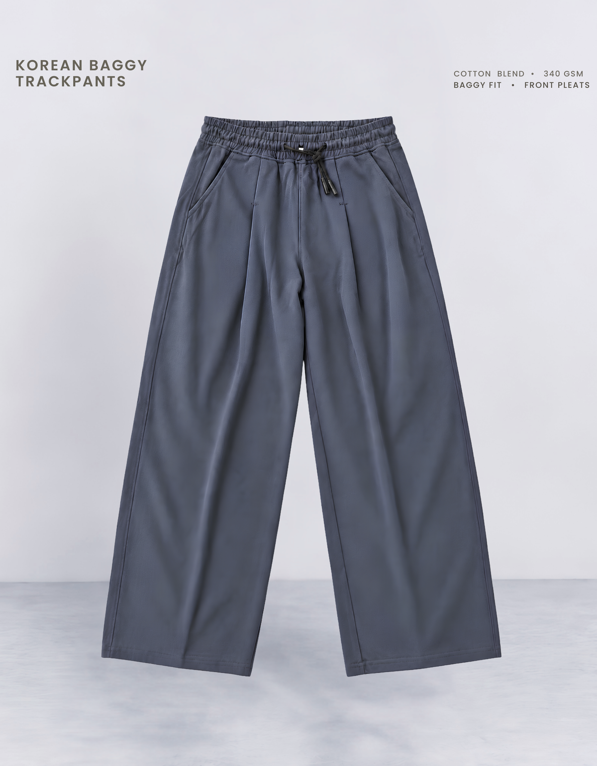 Blue Korean baggy pants front view, 340 GSM cotton blend with elasticated waistband and drawcord