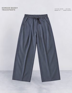 Blue Korean baggy pants front view, 340 GSM cotton blend with elasticated waistband and drawcord