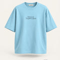 Minimal Baby Blue Oversized T-Shirt – premium front view with Minimal Supercape chest typography and SuperCape neck label; 240 GSM premium fabric, oversized drop shoulder T-shirt, 100% cotton