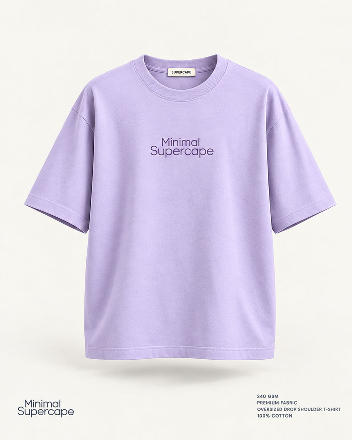 Minimal Lavender Oversized T-Shirt – premium front view with Minimal Supercape chest typography and SuperCape neck label; 240 GSM premium fabric, oversized drop shoulder T-shirt, 100% cotton