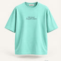 Minimal Mint Oversized T-Shirt – premium front view with Minimal Supercape chest typography and SuperCape neck label; 240 GSM premium fabric, oversized drop shoulder T-shirt, 100% cotton