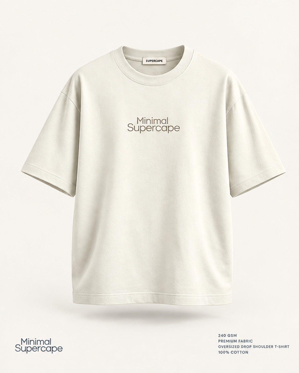 Minimal Off-White Oversized T-Shirt – premium front view with Minimal Supercape chest typography and SuperCape neck label; 240 GSM premium fabric, oversized drop shoulder T-shirt, 100% cotton