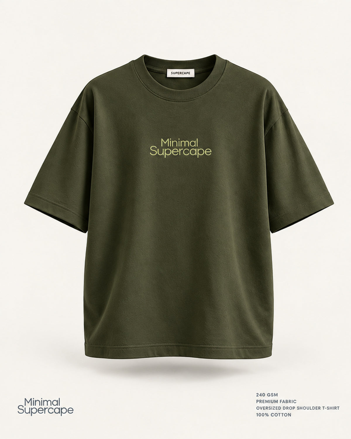 Minimal Olive Green Oversized T-Shirt – premium front view with Minimal Supercape chest typography and SuperCape neck label; 240 GSM premium fabric, oversized drop shoulder T-shirt, 100% cotton