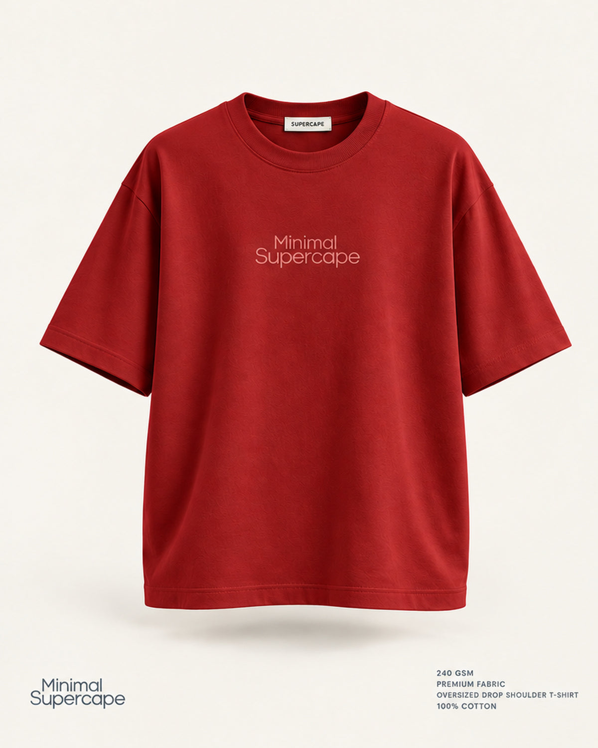 Minimal Red Oversized T-Shirt – premium front view with Minimal Supercape chest typography and SuperCape neck label; 240 GSM premium fabric, oversized drop shoulder T-shirt, 100% cotton