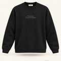 Minimal Black Unisex Sweatshirt — premium 3D front view with original tonal chest wordmark and SuperCape neck label