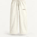 Minimal Off-White Unisex Sweatpants — premium 3D front view with approved warm-stone wordmark